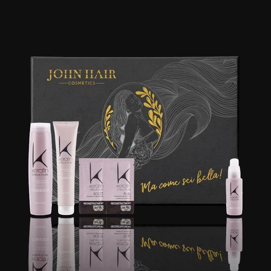 John Hair Keratin Structure Botox treatment kit with shampoo, mask, and fluid bottles displayed on a sunny beach.